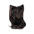 18-inch black wavy clip-in hair extension laid flat, showing the weft and curved ends