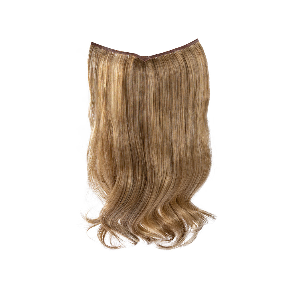 18-inch champagne blonde wavy clip-in hair extension laid flat, showing the weft and curved ends