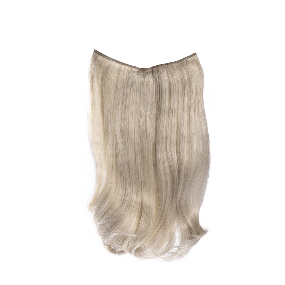 18-inch platinum blonde wavy clip-in hair extension laid flat, showing the weft and curved ends