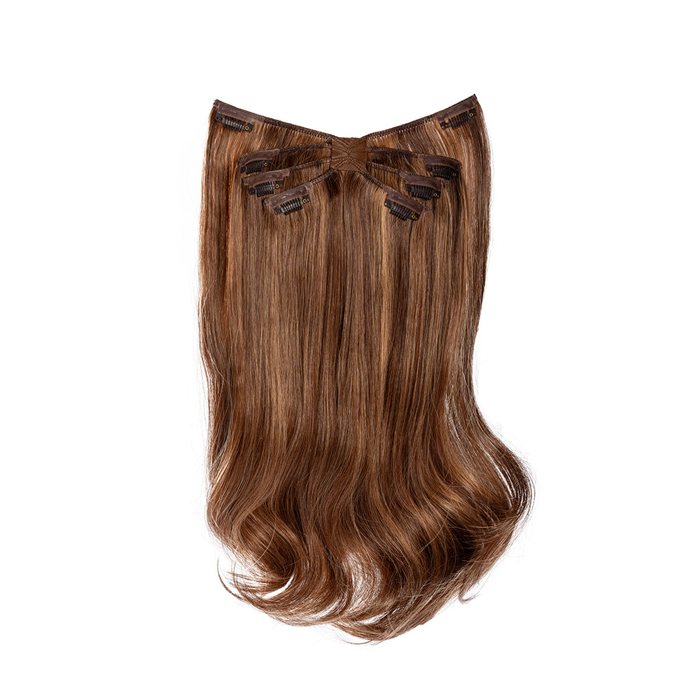 18-inch copper wavy clip-in hair extension laid flat, showing the weft and curved ends