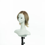 8.5-inch champagne blonde layered bob wig, three-quarter view facing left