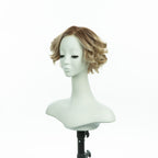 7-inch pearl blonde curly bob wig, three-quarter view facing left