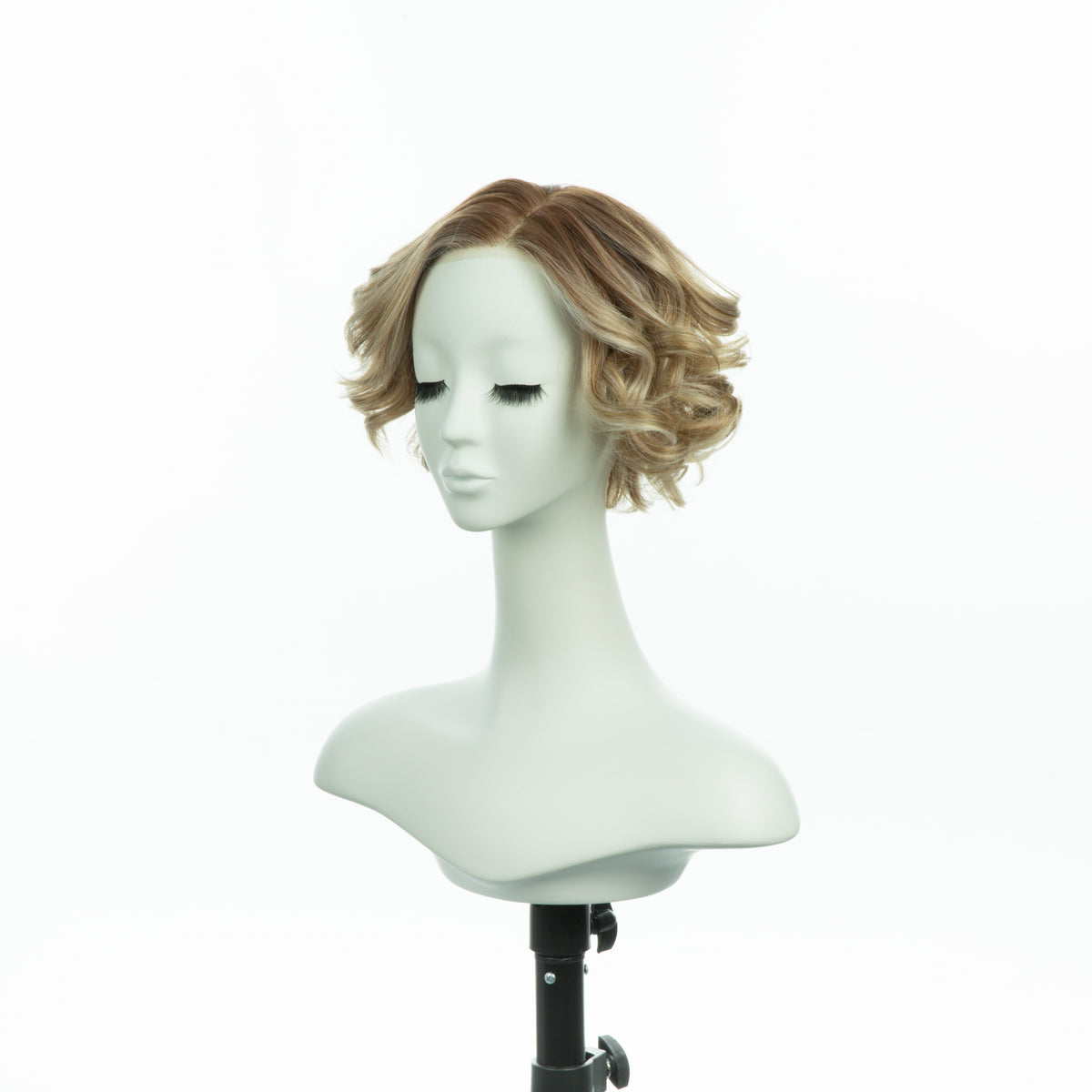 7-inch pearl blonde curly bob wig, three-quarter view facing left