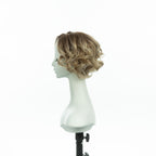 7-inch pearl blonde curly bob wig, profile facing left