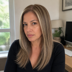 14-inch caramel brown straight hair topper worn in a sunlit home office