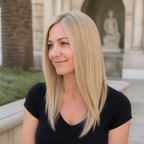 14-inch pastel blonde blend straight hair topper worn in a stone courtyard