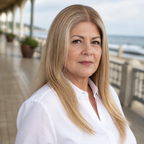 14-inch beige blonde highlights straight hair topper worn on a seaside balcony