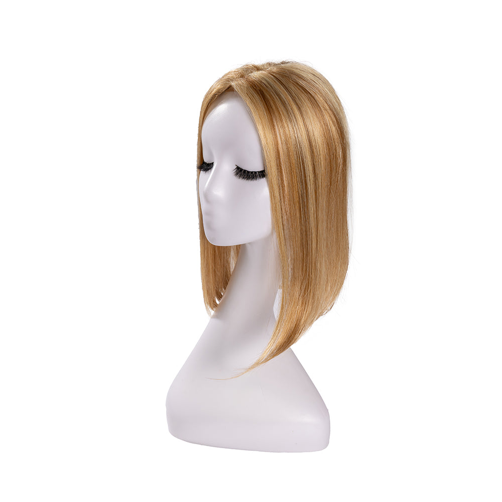 14-inch honey blonde straight hair topper on a mannequin, showing the parting and shape
