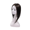 14-inch black straight hair topper on a mannequin, showing the parting and shape