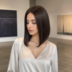 14-inch dark brown straight hair topper worn in an art gallery