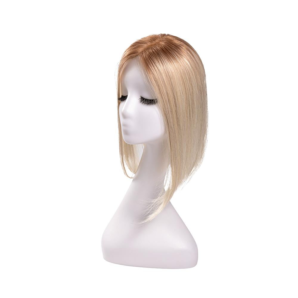 14-inch rooted platinum blonde straight hair topper on a mannequin, showing the parting and shape