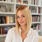 14-inch rooted pastel blonde straight hair topper worn in a library