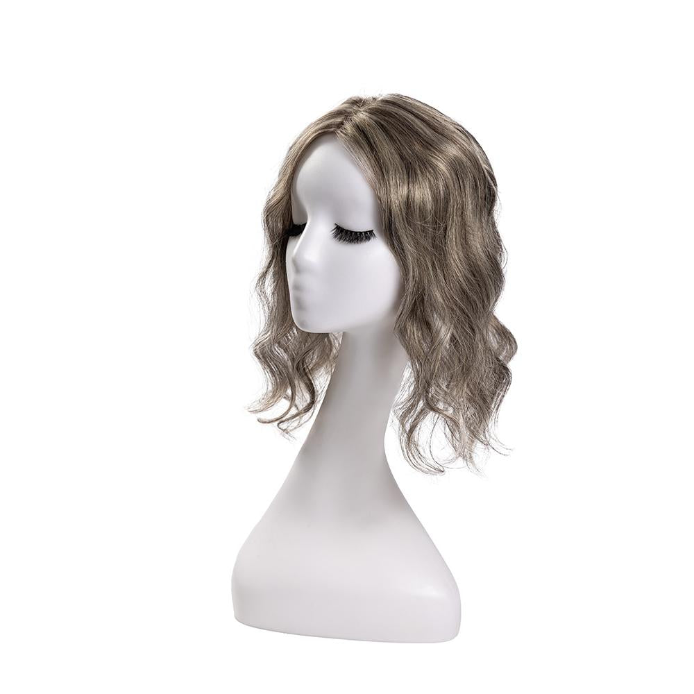 14-inch grey wavy hair topper on a mannequin, showing the parting and shape