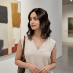 14-inch dark brown wavy hair topper worn in an art gallery