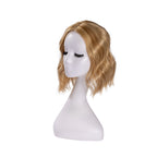 12-inch honey blonde wavy hair topper on a mannequin, showing the parting and shape