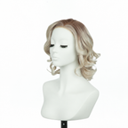 Rooted platinum blonde 9-inch curly bob synthetic wig, left three-quarter view