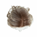 Top view showing the parting on a rooted platinum blonde curly bob wig